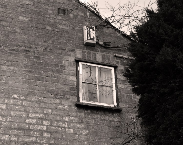 High window, writer's cell or dreamer's garrett?